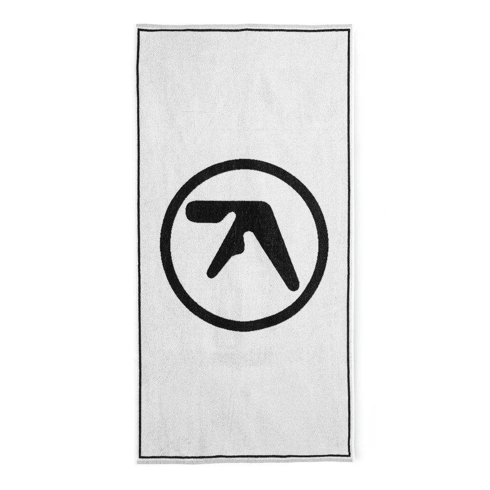 Aphex-Twin_On-beach-towel_1